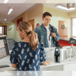 Zebra zc300 printer in use at a medical clinic front desk for staff and visitor id card printing.