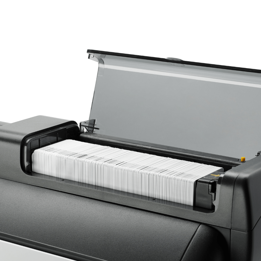 Customer testimonial with Zebra ZXP Series 7 Card Printer and printed blank ID cards on display.