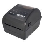 Polaroid compact portable printer from a slightly elevated angle showing a control panel and paper slot