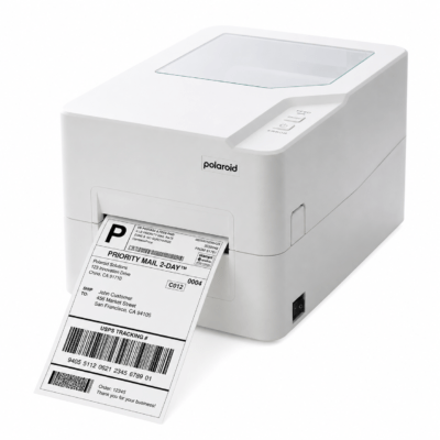 White polaroid label printer ejecting a printed shipping label with barcode and address details